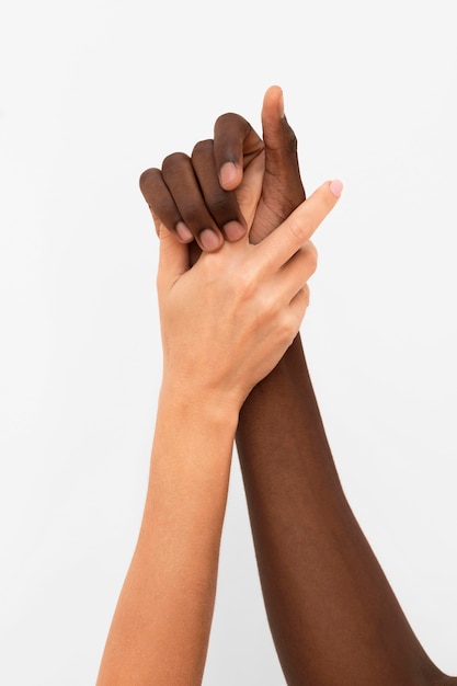Free Photo multiracial hands coming together