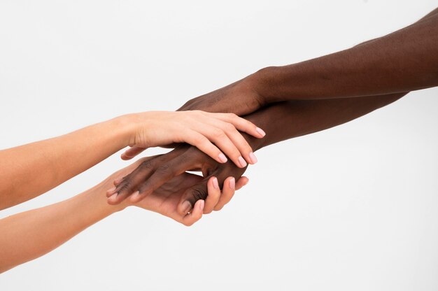 Free Photo multiracial hands coming together