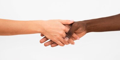 multiracial hands coming together