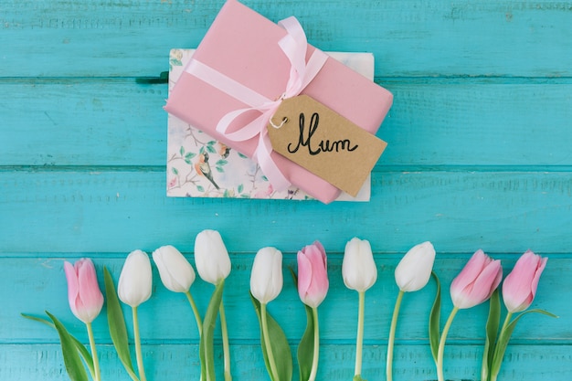 Mum inscription with tulips and gift