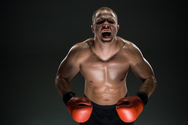 Muscular man screaming and roaring