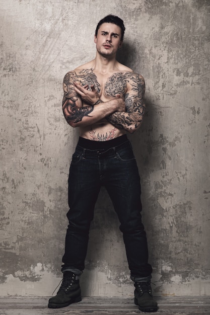 muscular man with tattoo