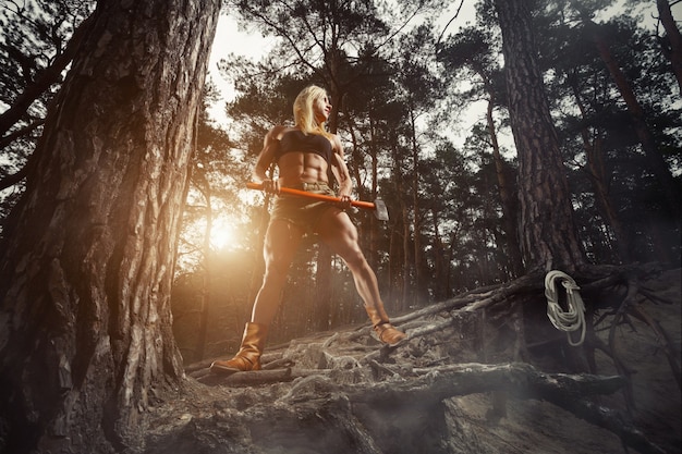 Free photo muscular woman with an ax