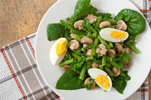 Mushroom salad with green beans and eggs