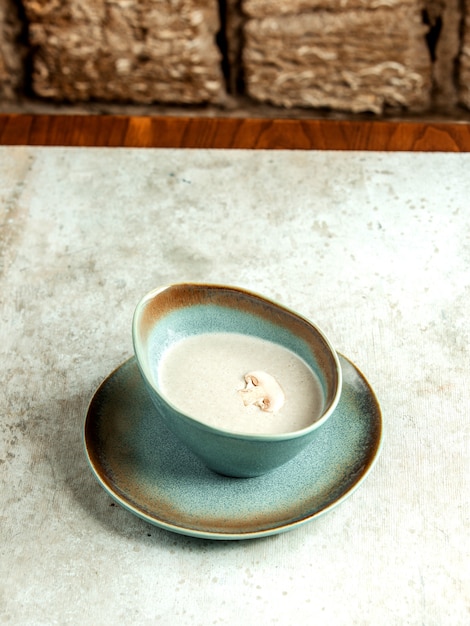 Mushroom soup in blue plate