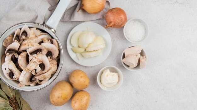 Mushroom soup in kettle and veggies