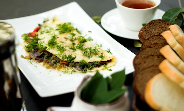 Mushroom with herbs wrapped in eggs