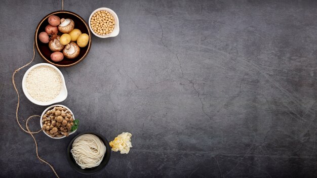 Mushrooms bowl with noodle bowl on a grey backgreound