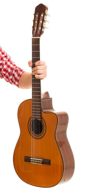 Music, close-up. Man holding a wooden guitar