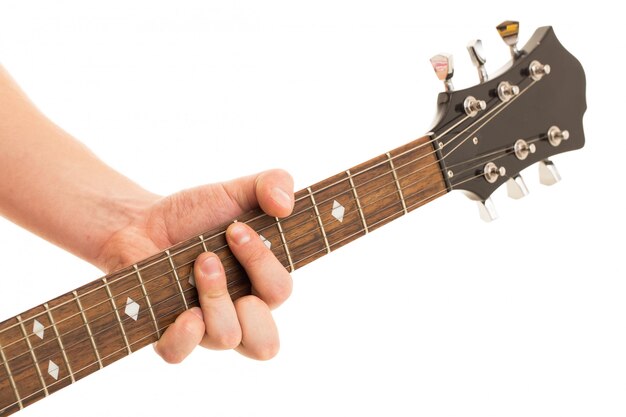 Music, close-up. Musician holding electro guitar