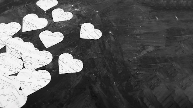 Free photo music notes on heart shaped paper