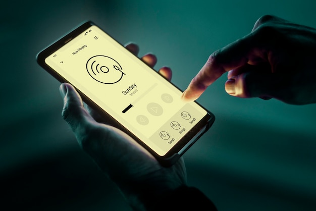 Foto gratuita app di streaming musicale su un telefono cellulare
