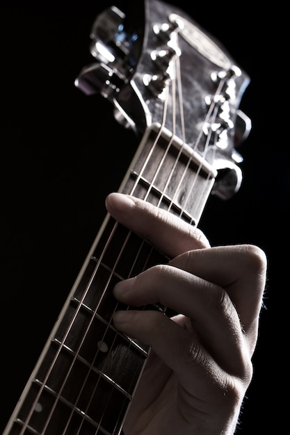 Musician playing on guitar