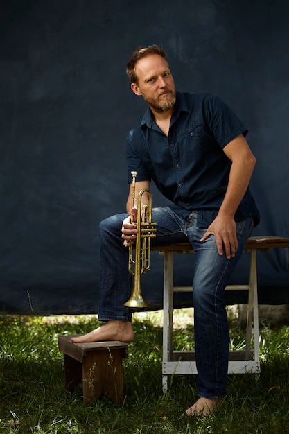 musician posing with his instrument