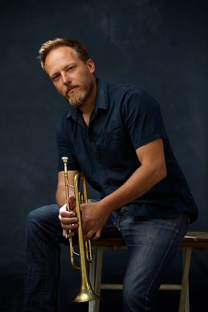 musician posing with his instrument