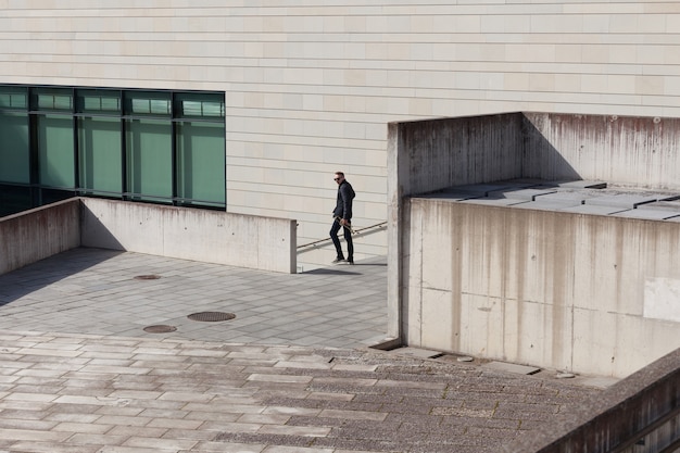 Musician walking downstairs