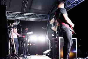 Free photo musicians on stage during a concert