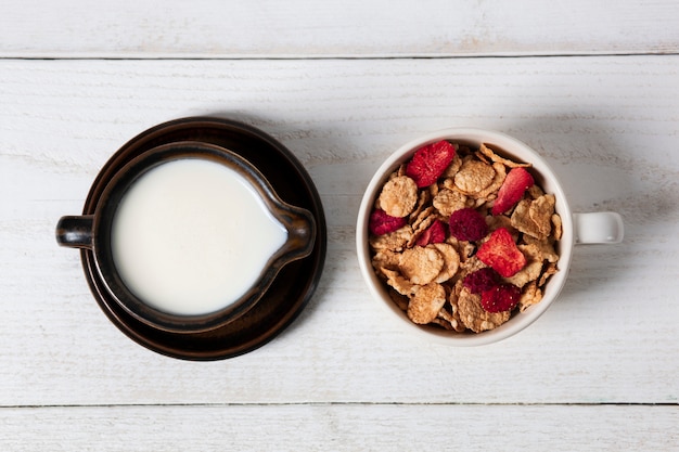 Musli with dried raspberries and milk