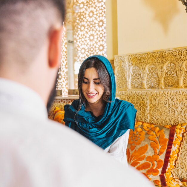 Muslim couple in arab restaurant