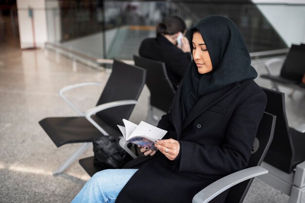 Muslim person travelling through the city