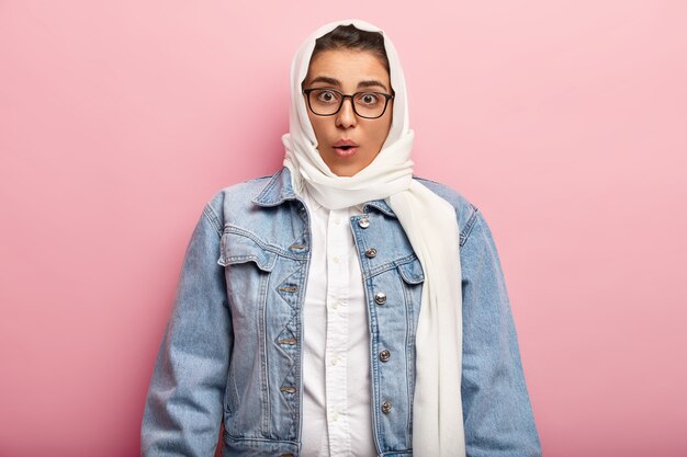 Muslim woman wearing denim jacket