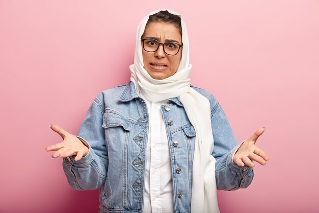 Muslim woman wearing denim jacket