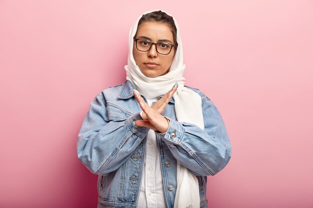 Muslim woman wearing denim jacket