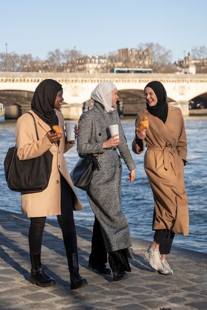 Muslim women traveling in paris together