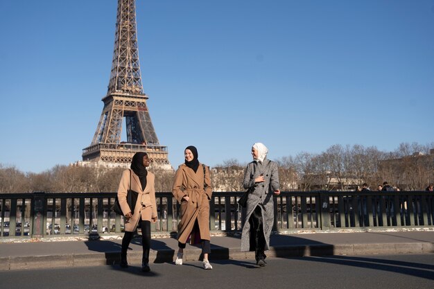 Muslim women traveling in paris together