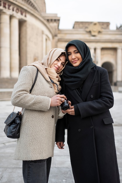 Free photo muslim women traveling together