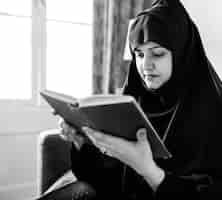 Free photo muslims reading from the quran