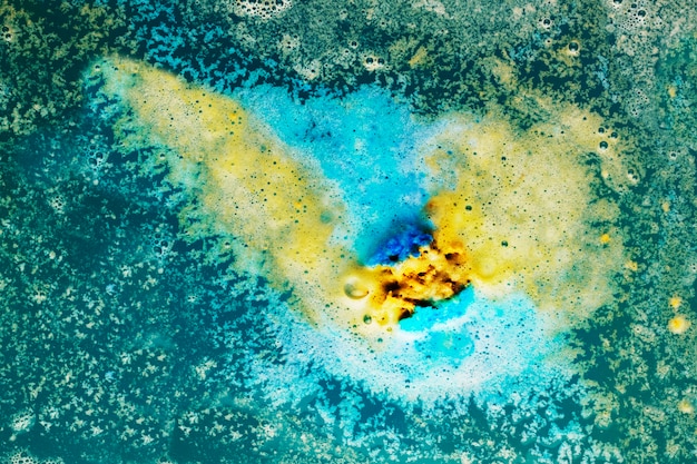 Free photo mustard foam amidst blue