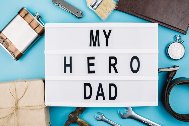 My hero dad title on tablet near male accessories