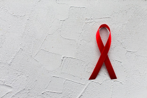 Myeloma ribbon on plaster background