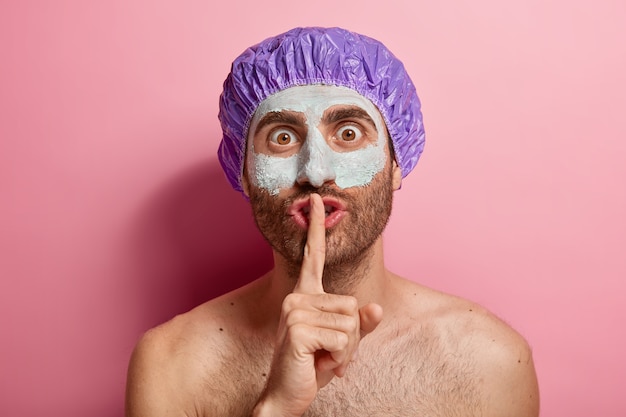 Mysterious male doing his beauty routine