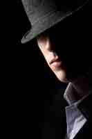 Free photo mysterious man in hat