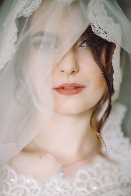 Mysterious portrait of a bride hidden under the veil