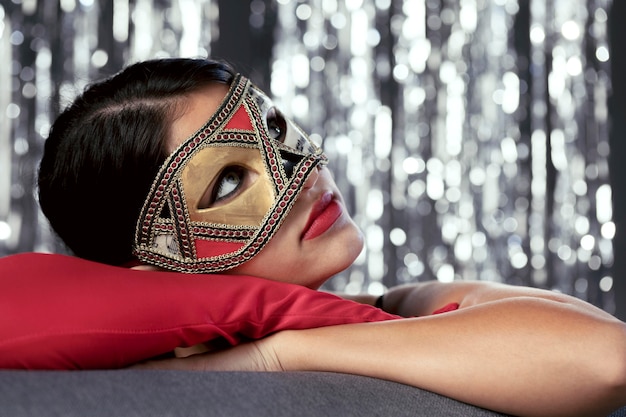 Mysterious woman with carnival mask