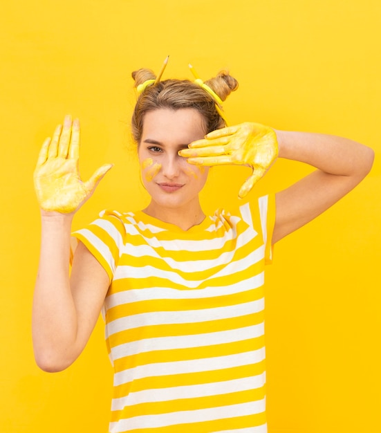 Free photo mysterious woman with painted hands