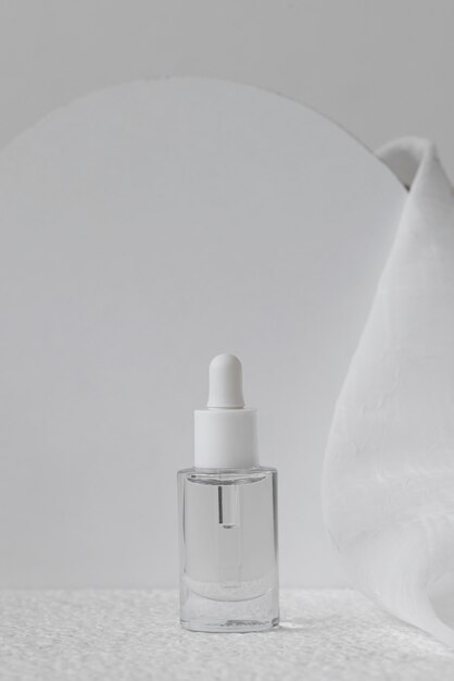 Nail serum with transparent bottle and cloth