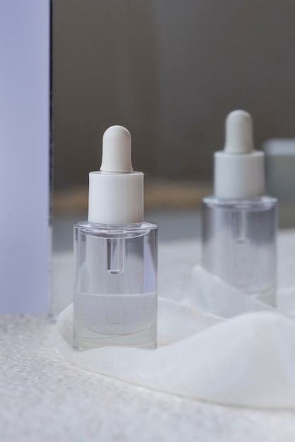 Nail serum with transparent bottle and mirror