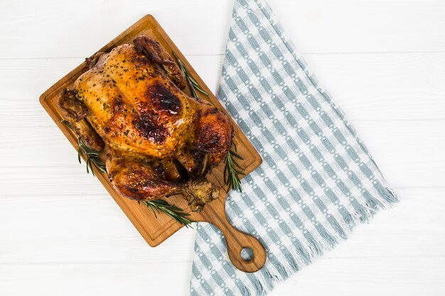 Napkin near roasted chicken