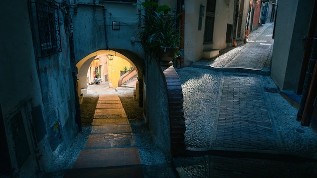 Free photo narrow medieval street in sanremo at night italy