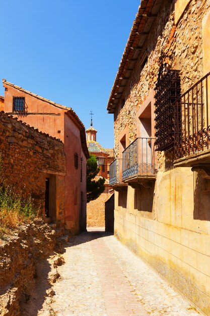 Narrow street of old town in summer