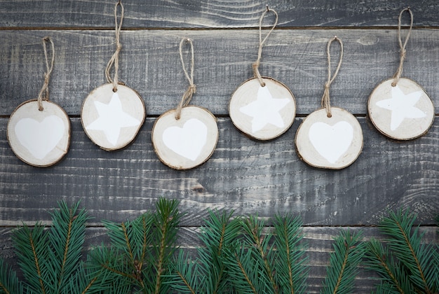 Free photo natural christmas decoration hanging on wooden wall