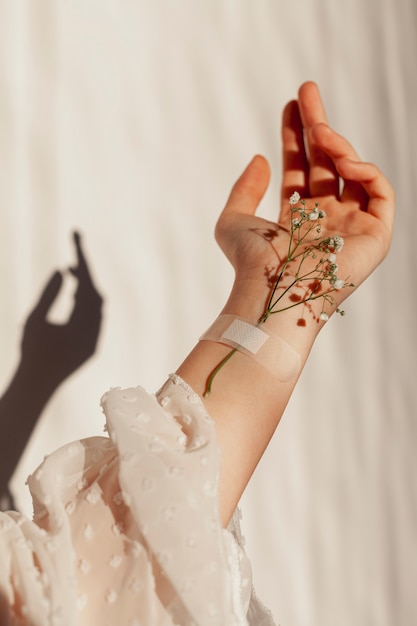 Natural flowers stuck on hand