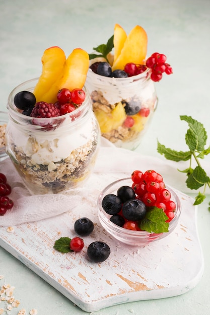 Natural healthy desserts in transparent glasses