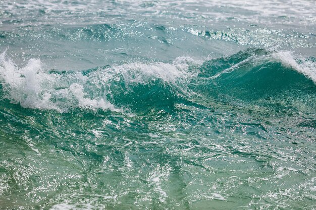 Natural pattern of blue rough water surface with waves