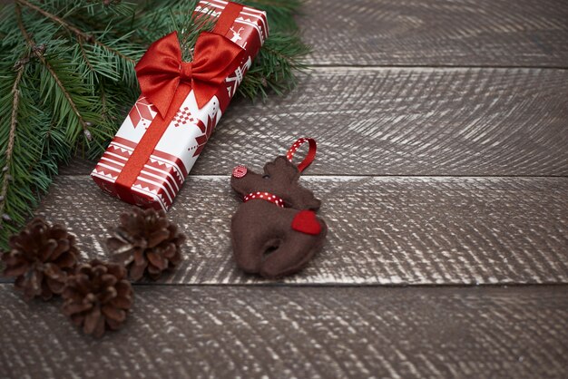 Natural plank and christmas ornaments