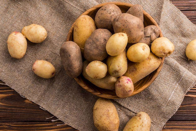 Natural potatoes on bowl